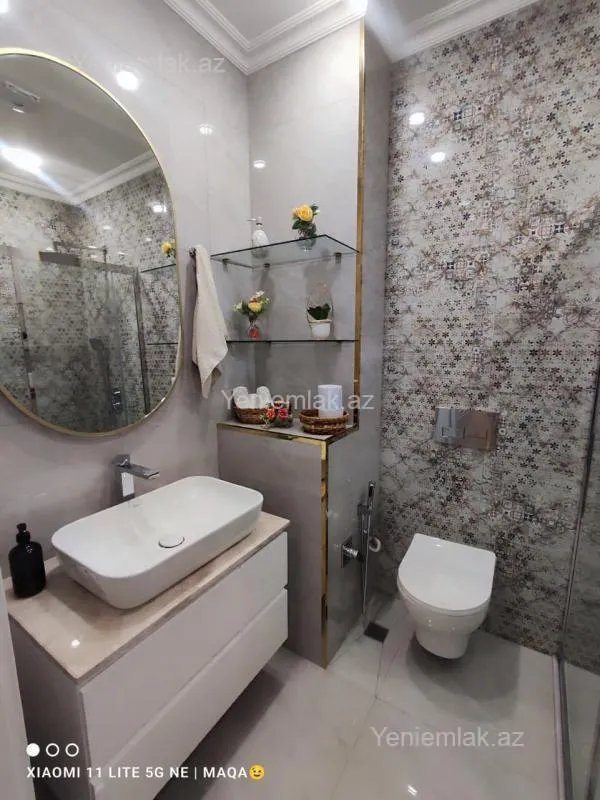 Satılır 3 otaqlı yeni tikili 100 m²