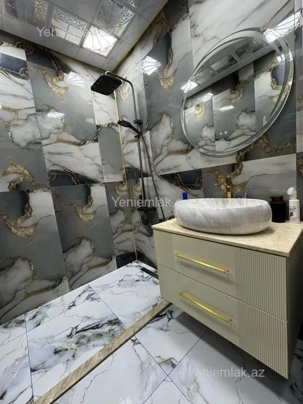 Satılır 3 otaqlı yeni tikili 100 m²