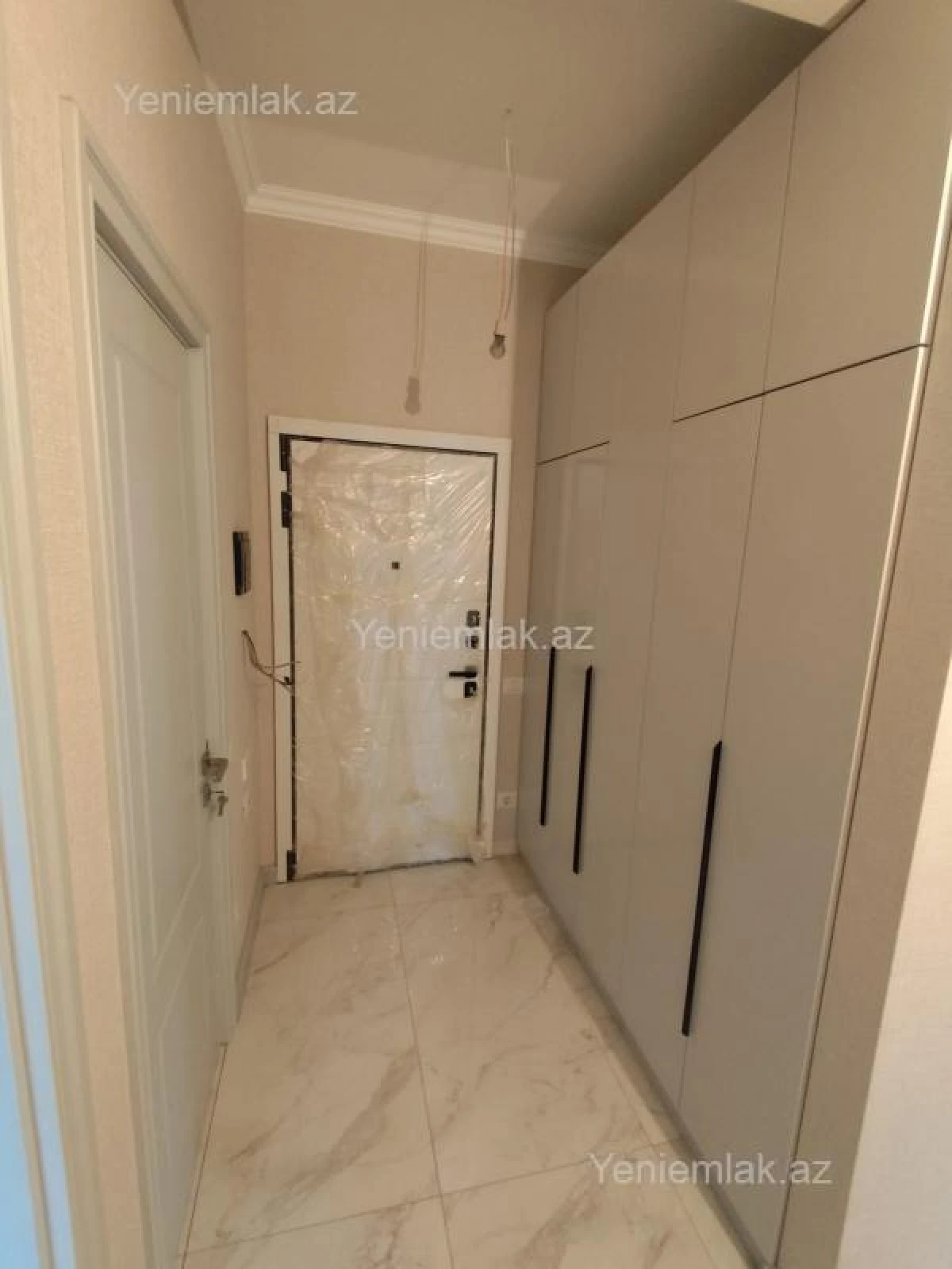 Satılır 2 otaqlı yeni tikili 61 m²