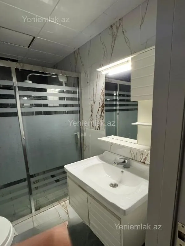 Satılır 2 otaqlı yeni tikili 55 m²