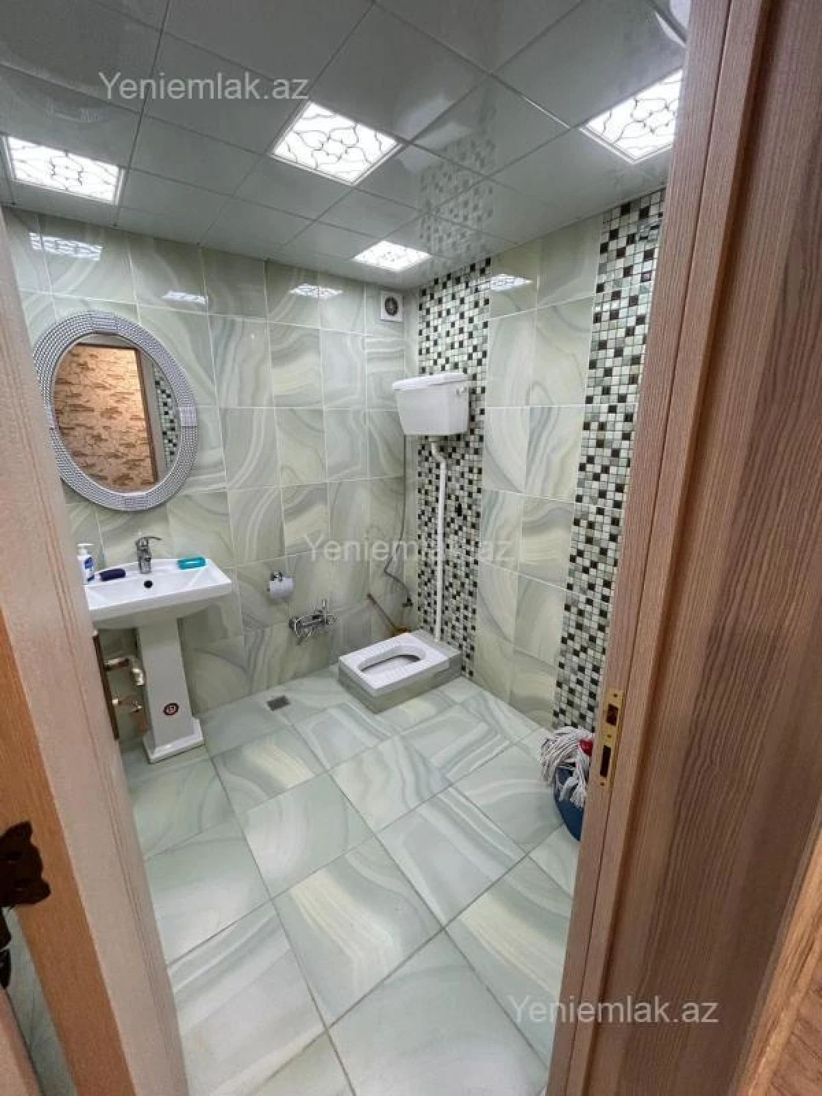 Satılır 10 otaqlı həyət evi 390 m²