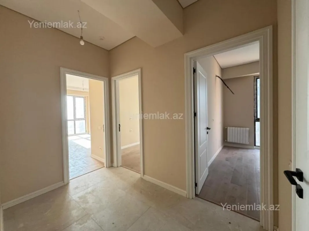 Satılır 2 otaqlı yeni tikili 63.99 m²