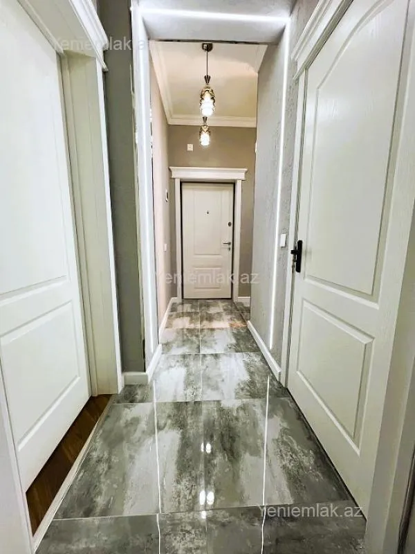 Satılır 2 otaqlı yeni tikili 65 m²