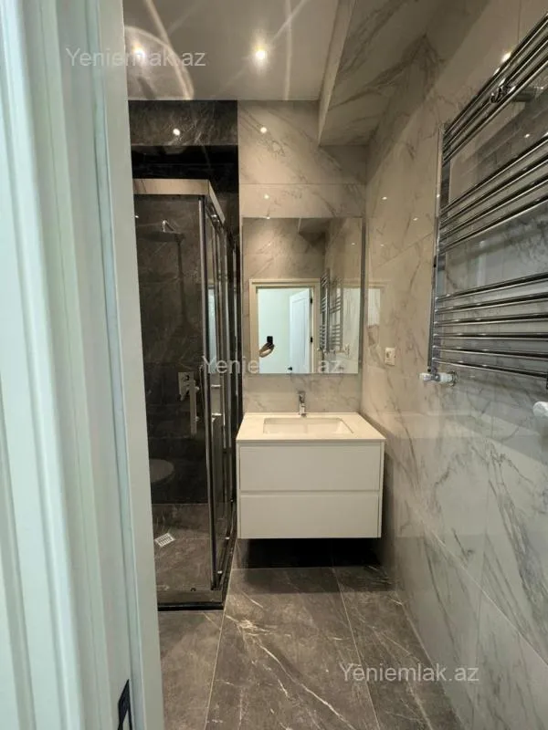 Satılır 2 otaqlı yeni tikili 60 m²