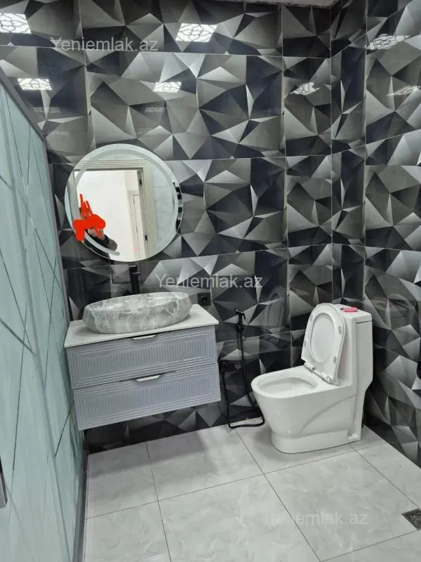 Satılır 3 otaqlı yeni tikili 128 m²