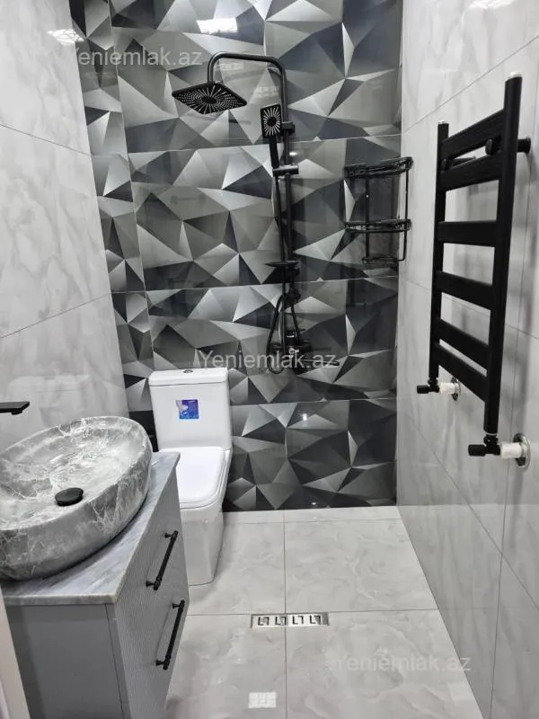 Satılır 3 otaqlı yeni tikili 128 m²