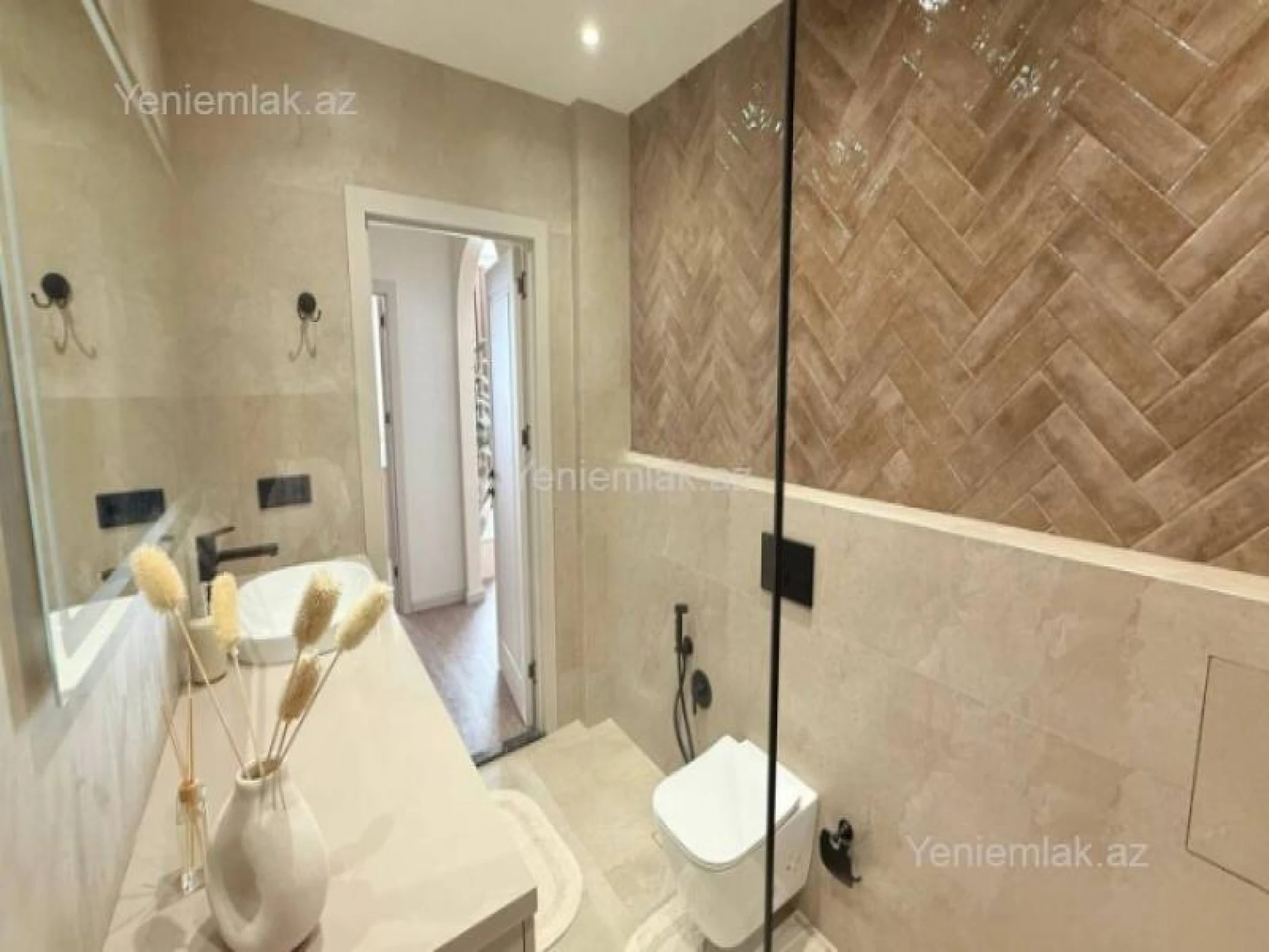 Satılır 2 otaqlı yeni tikili 60 m²