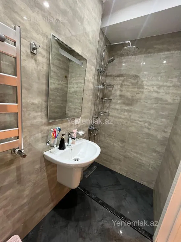 Satılır 2 otaqlı yeni tikili 52 m²