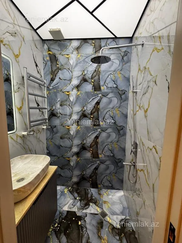 Satılır 3 otaqlı yeni tikili 95 m²