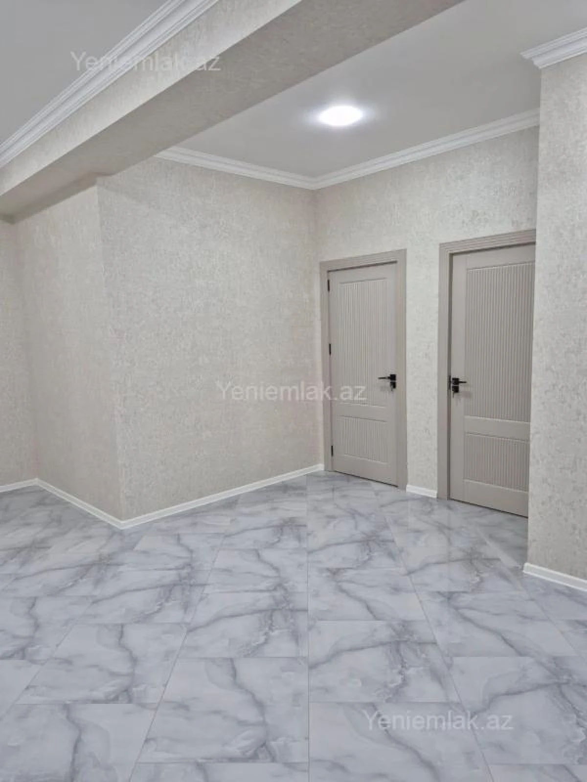 Satılır 3 otaqlı yeni tikili 128 m²