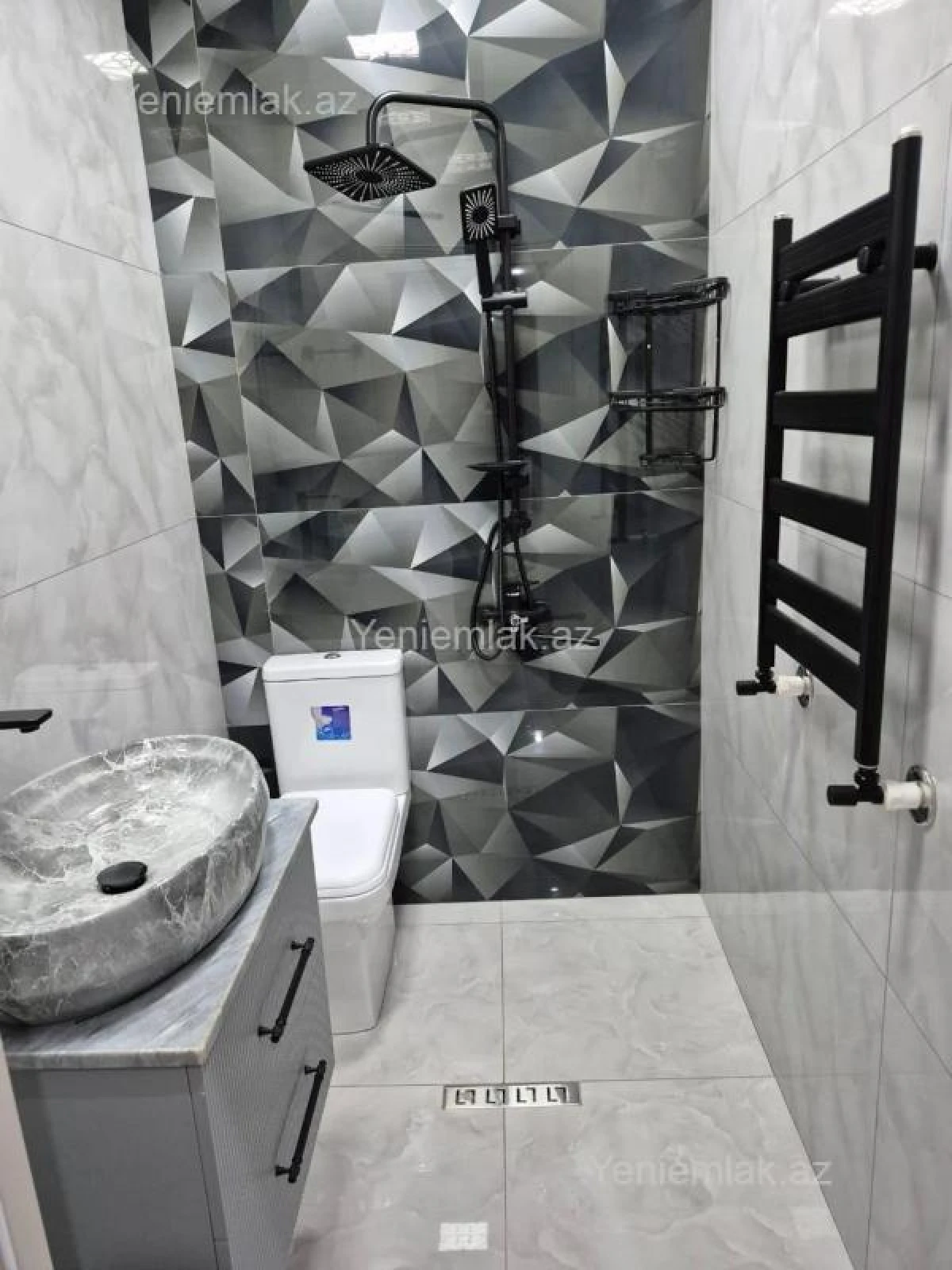 Satılır 3 otaqlı yeni tikili 128 m²