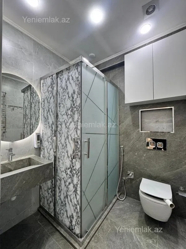 Satılır 3 otaqlı yeni tikili 100 m²