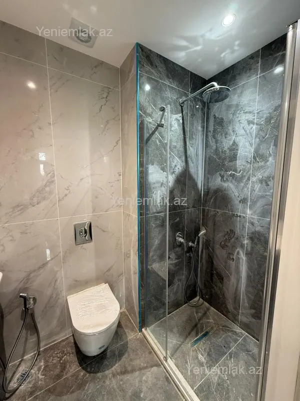 Satılır 2 otaqlı yeni tikili 55 m²