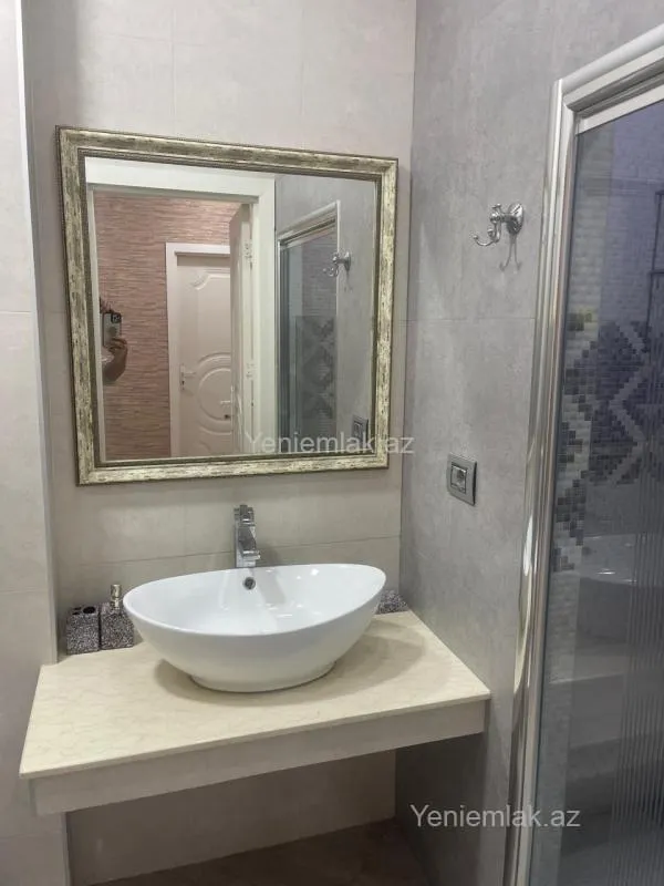 Satılır 3 otaqlı yeni tikili 100 m²