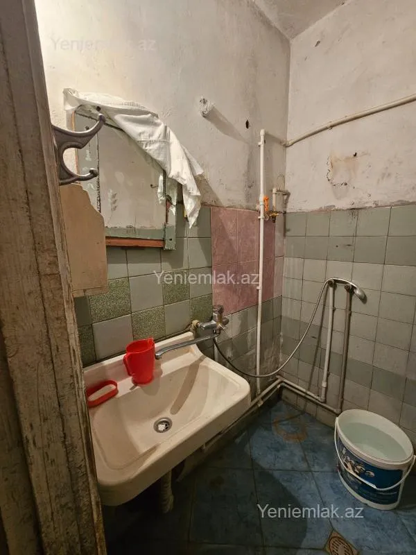Satılır 2 otaqlı köhnə tikili 56 m²