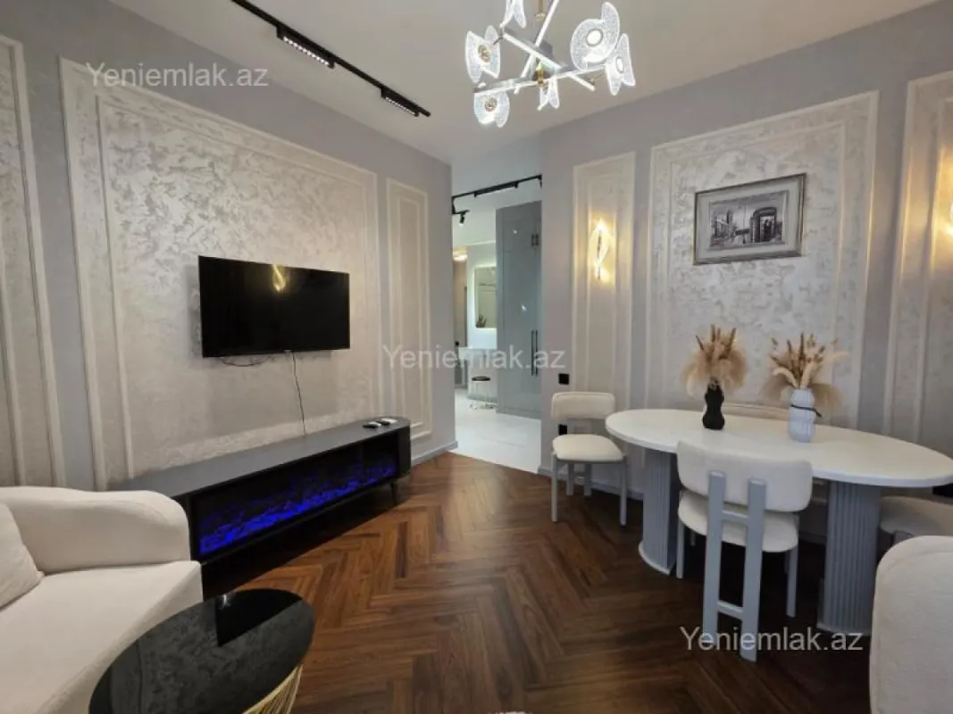 Satılır 2 otaqlı yeni tikili 55 m²