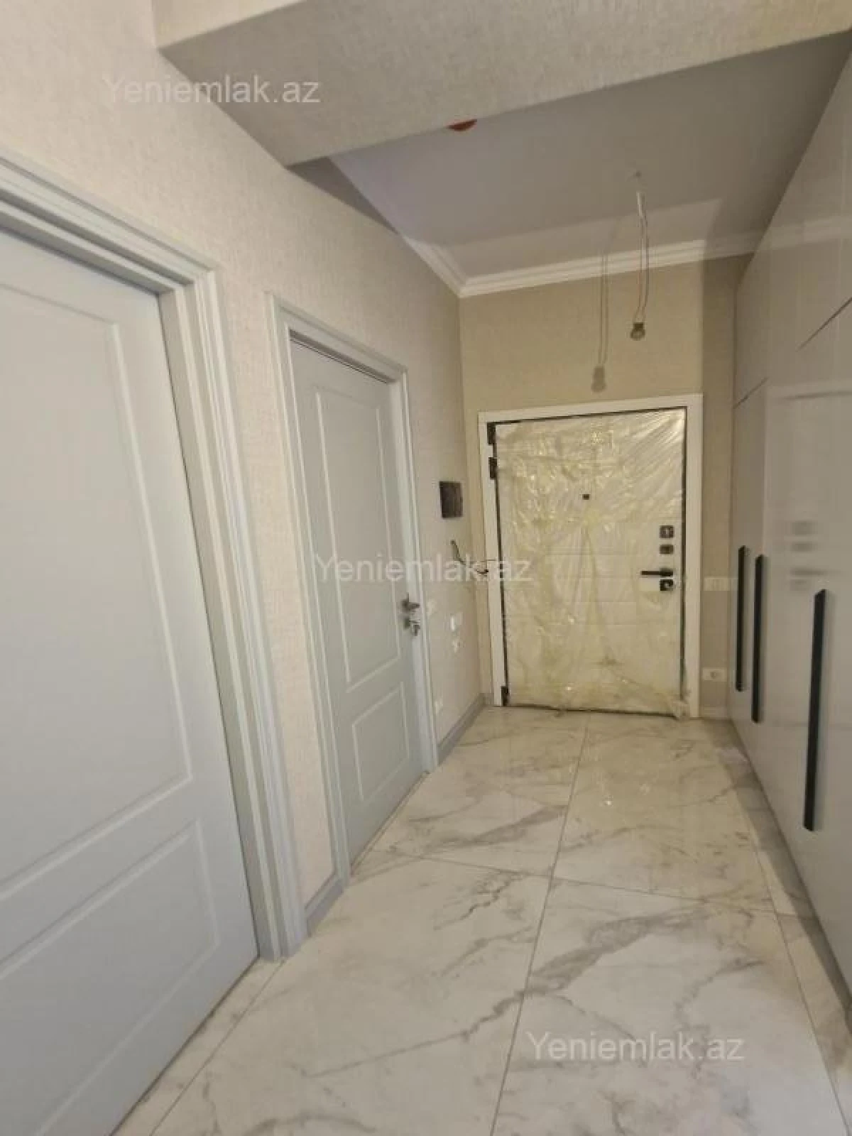 Satılır 2 otaqlı yeni tikili 61 m²