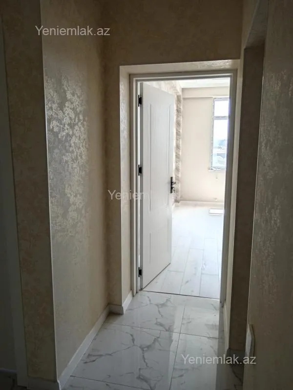 Satılır 2 otaqlı yeni tikili 56.5 m²