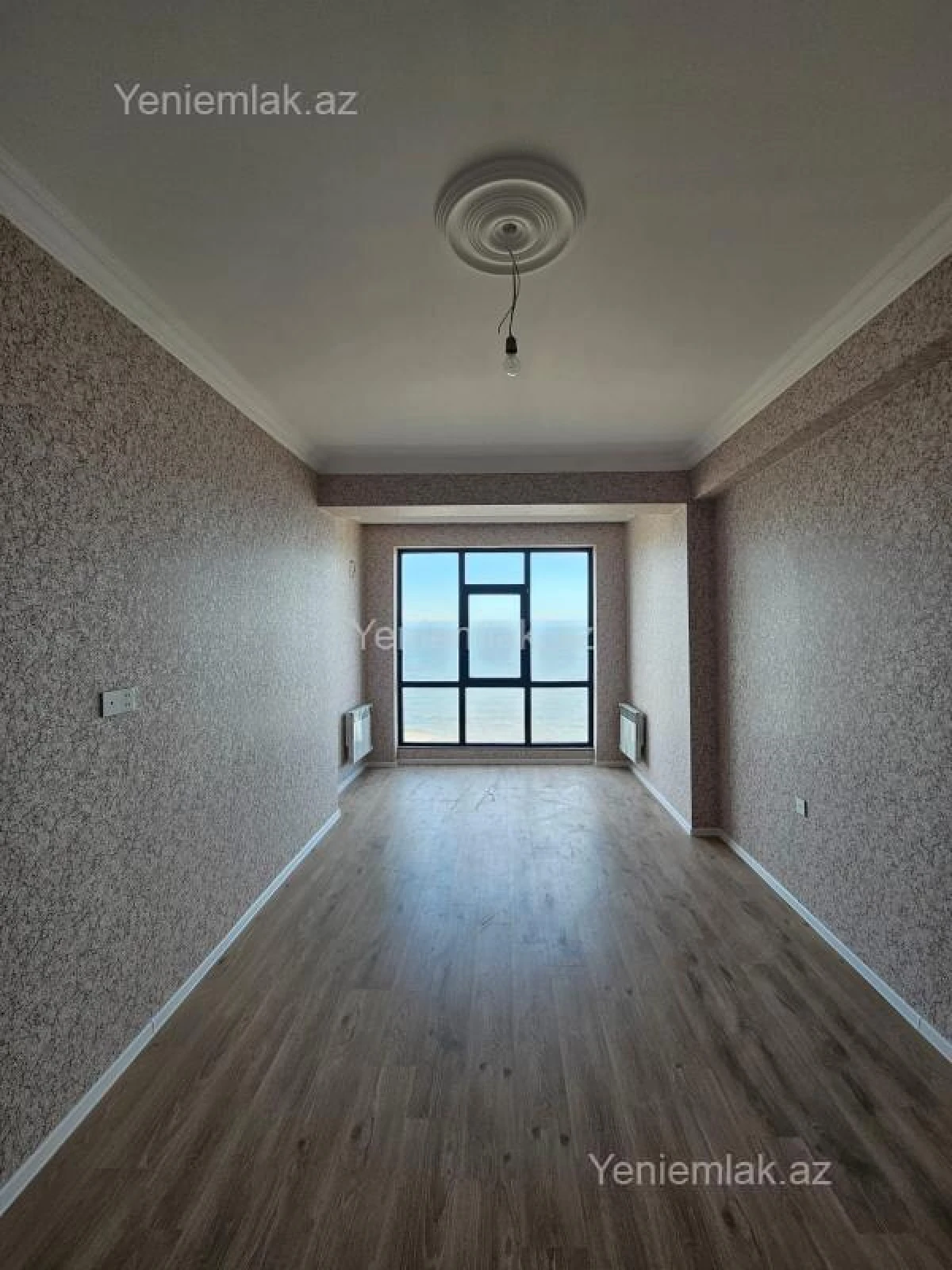 Satılır 2 otaqlı yeni tikili 75 m²