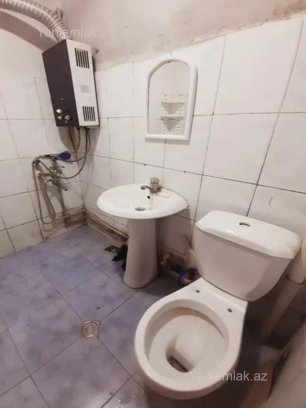 Satılır 2 otaqlı köhnə tikili 52 m²
