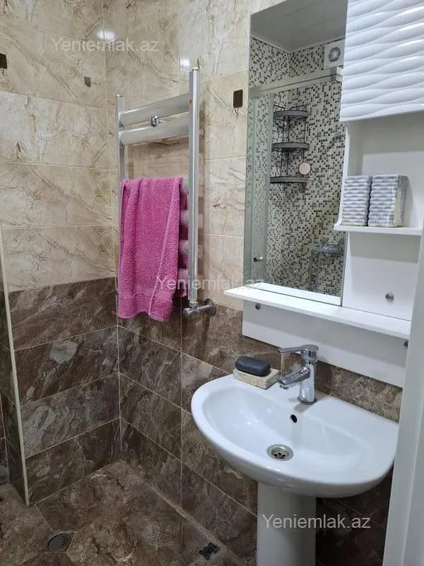 Satılır 2 otaqlı yeni tikili 60 m²