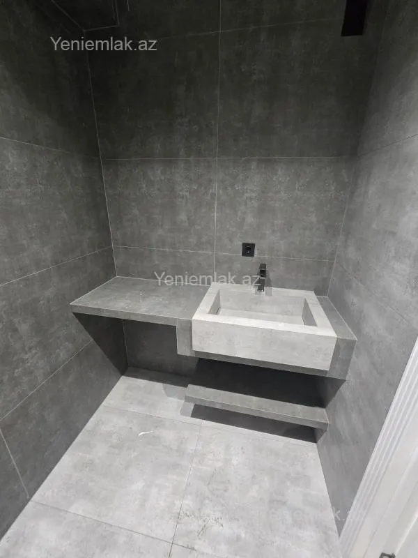 Satılır 2 otaqlı yeni tikili 62.7 m²