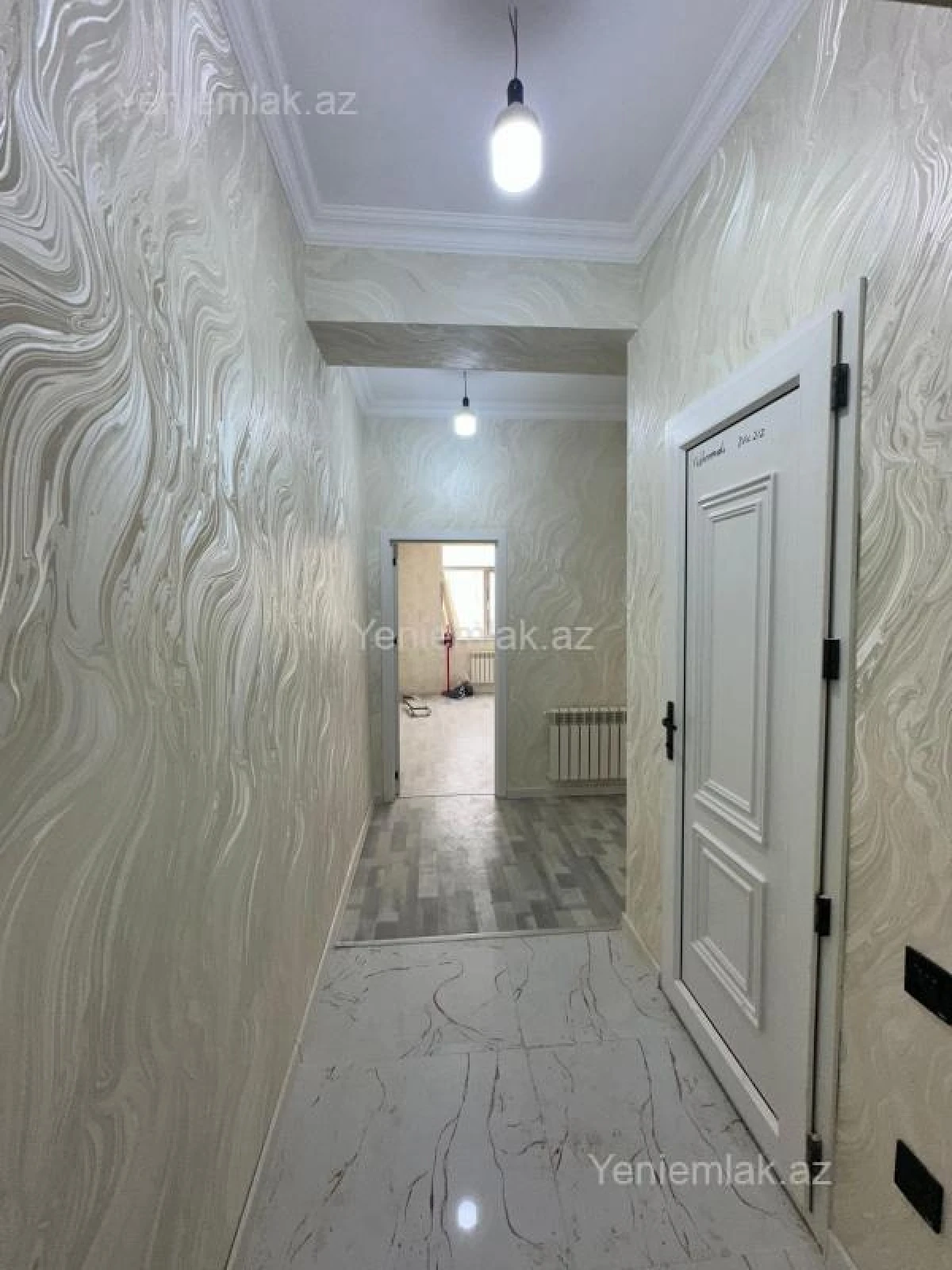 Satılır 2 otaqlı yeni tikili 55 m²