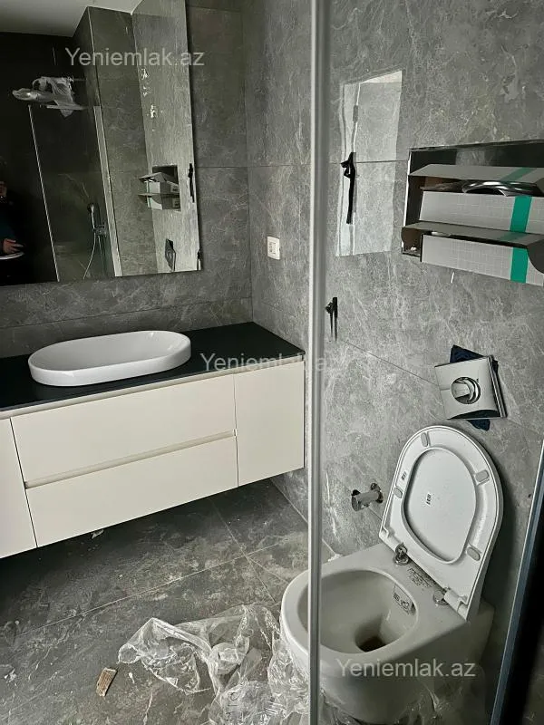 Satılır 4 otaqlı yeni tikili 130 m²