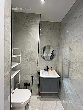 Satılır 2 otaqlı yeni tikili 54.8 m²