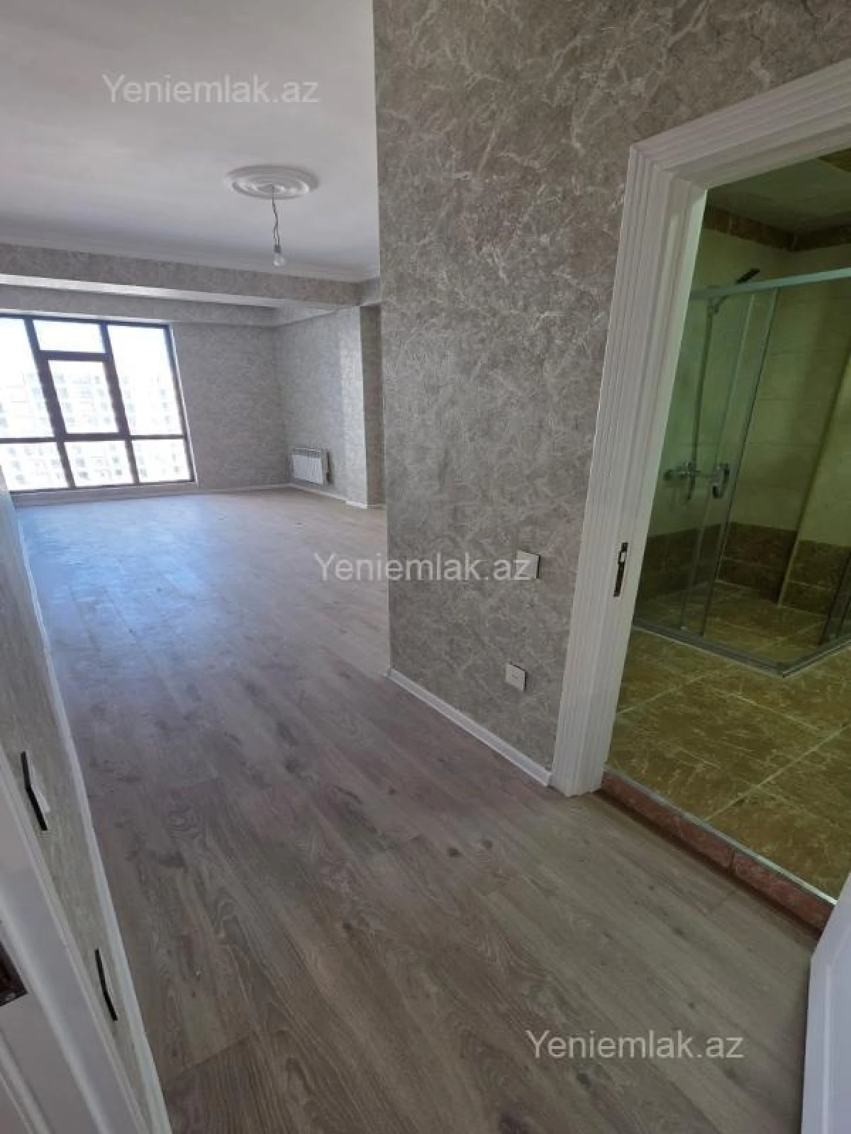 Satılır 3 otaqlı yeni tikili 125 m²