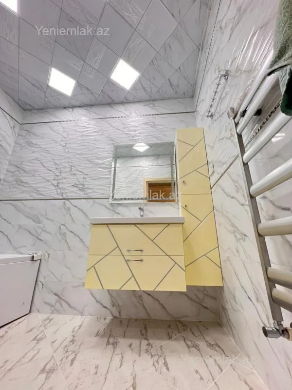 Satılır 3 otaqlı yeni tikili 100 m²