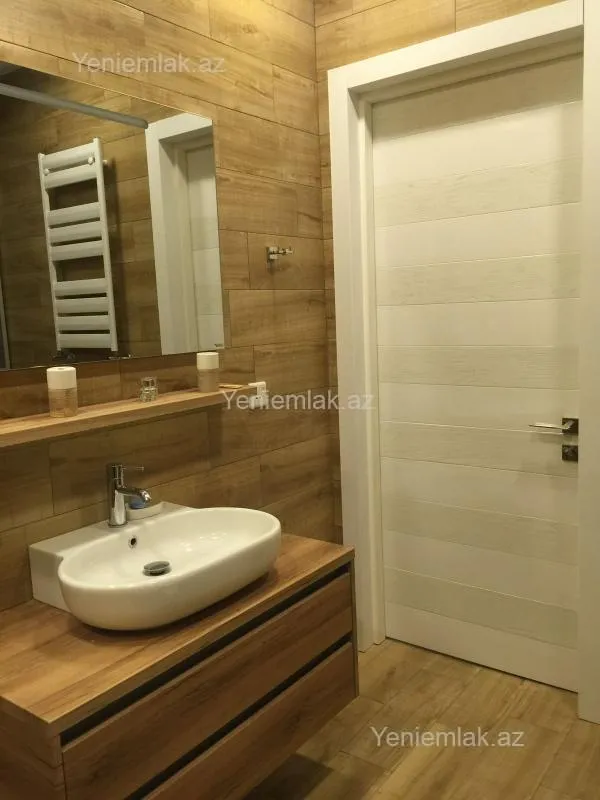 Satılır 4 otaqlı yeni tikili 210 m²