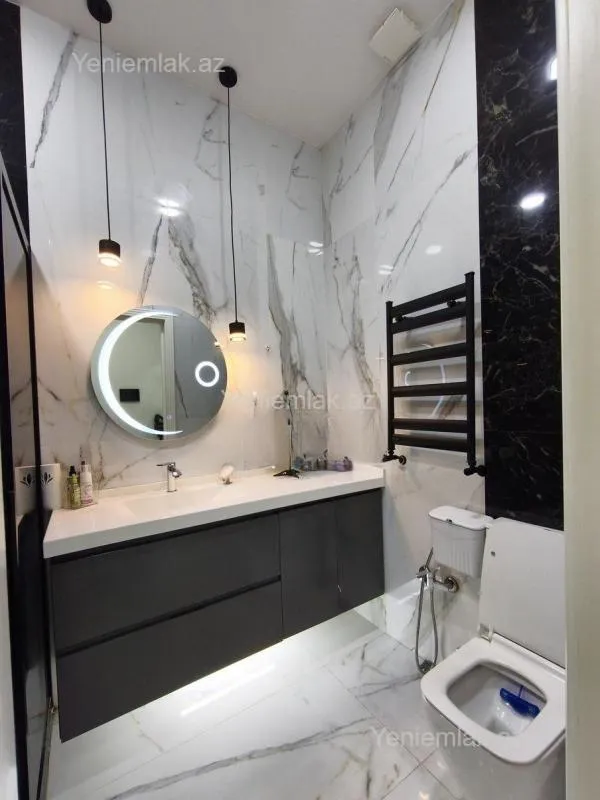 Satılır 3 otaqlı yeni tikili 100 m²