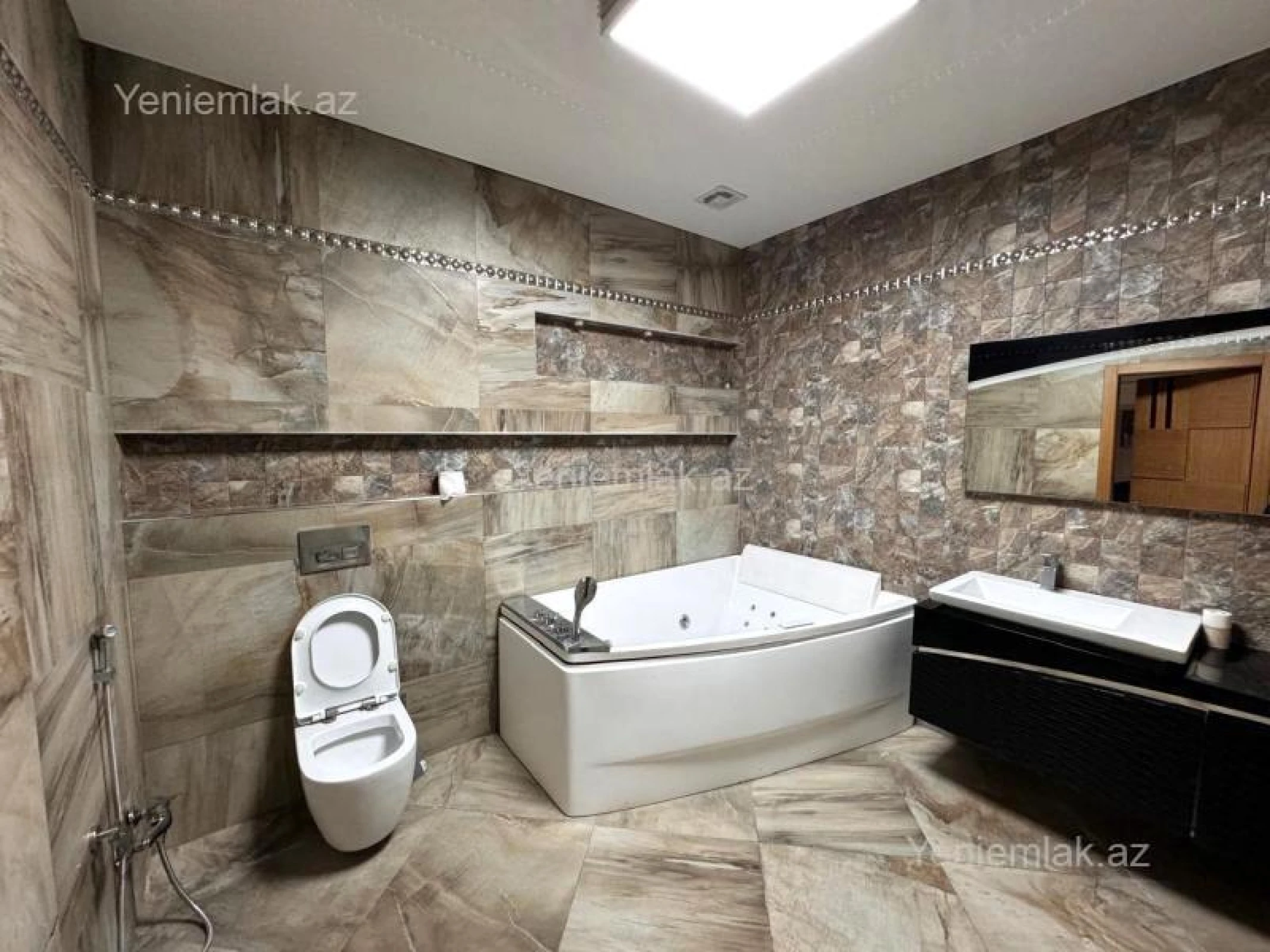 Satılır 4 otaqlı yeni tikili 200 m²