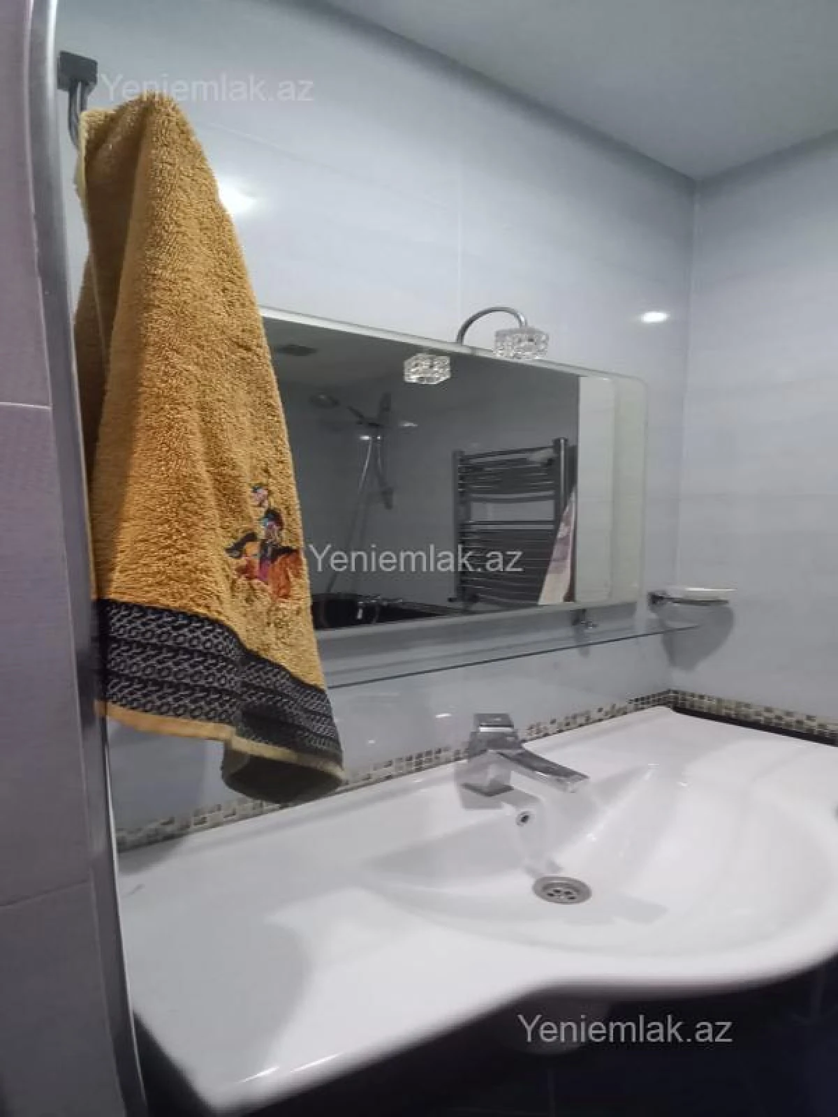 Satılır 3 otaqlı yeni tikili 100 m²