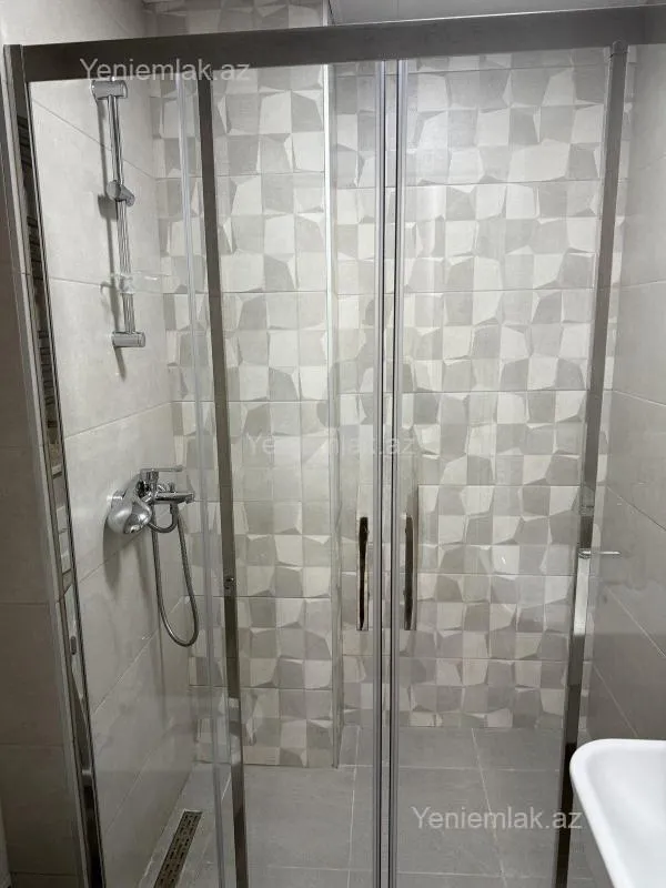 Satılır 2 otaqlı yeni tikili 55 m²