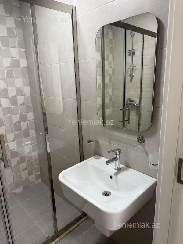 Satılır 2 otaqlı yeni tikili 55 m²