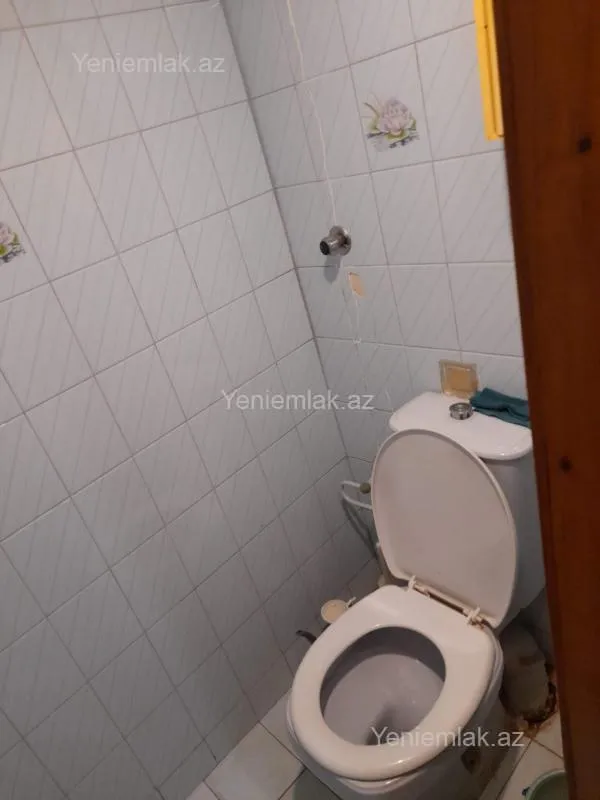 Satılır 2 otaqlı köhnə tikili 55 m²