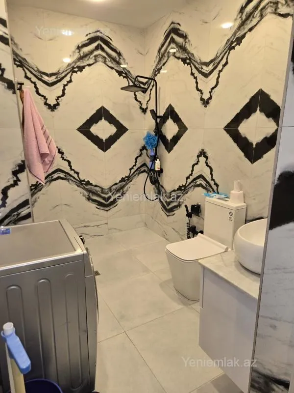 Satılır 2 otaqlı yeni tikili 55 m²