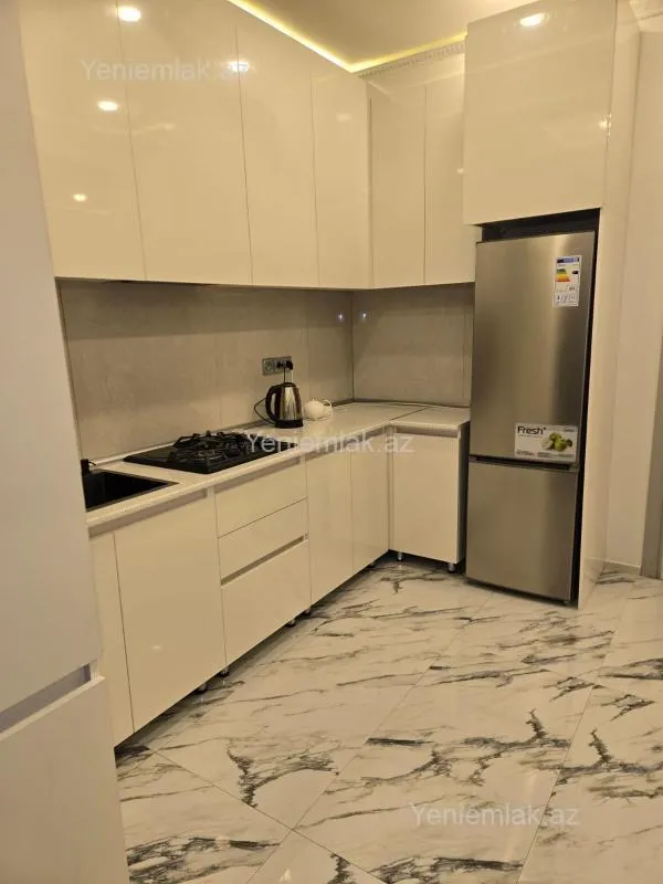 Satılır 2 otaqlı yeni tikili 55 m²
