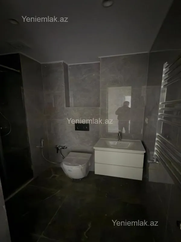 Satılır 2 otaqlı yeni tikili 64 m²