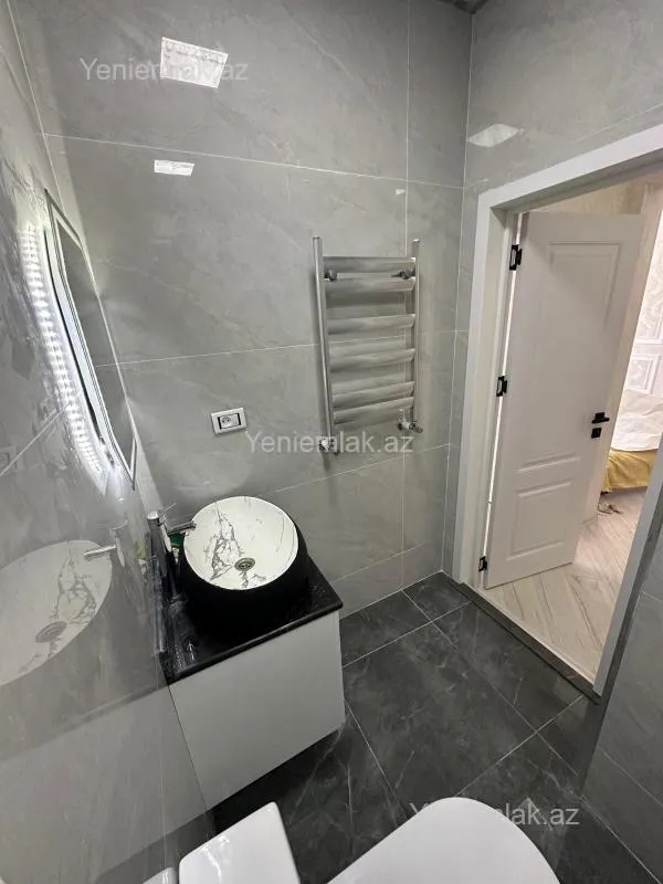 Satılır 2 otaqlı yeni tikili 72 m²