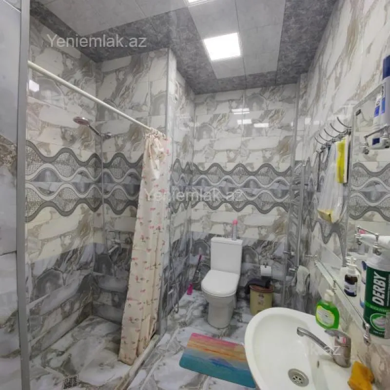 Satılır 2 otaqlı yeni tikili 60 m²