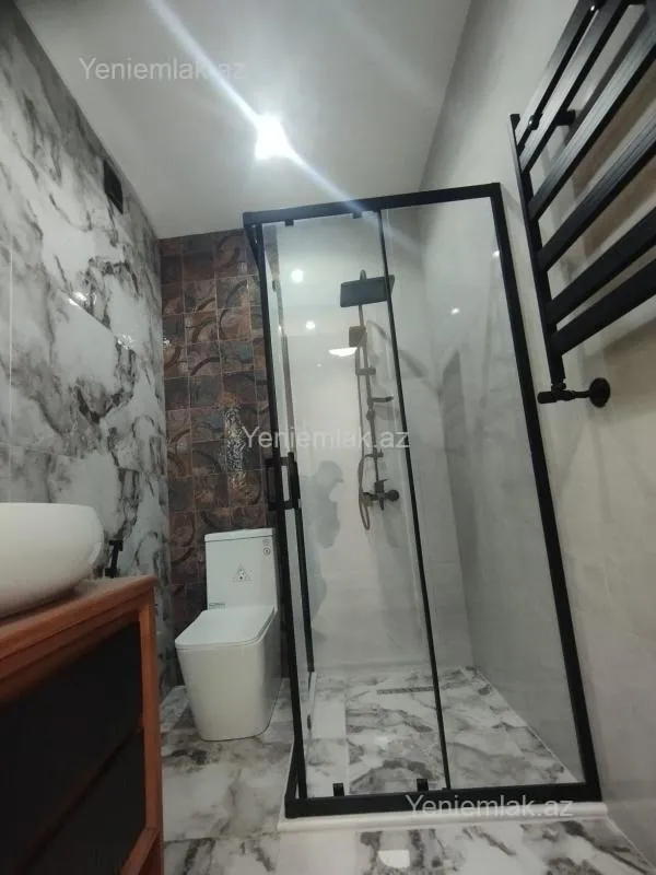 Satılır 2 otaqlı yeni tikili 65.2 m²