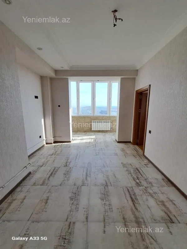 Satılır 2 otaqlı yeni tikili 74 m²