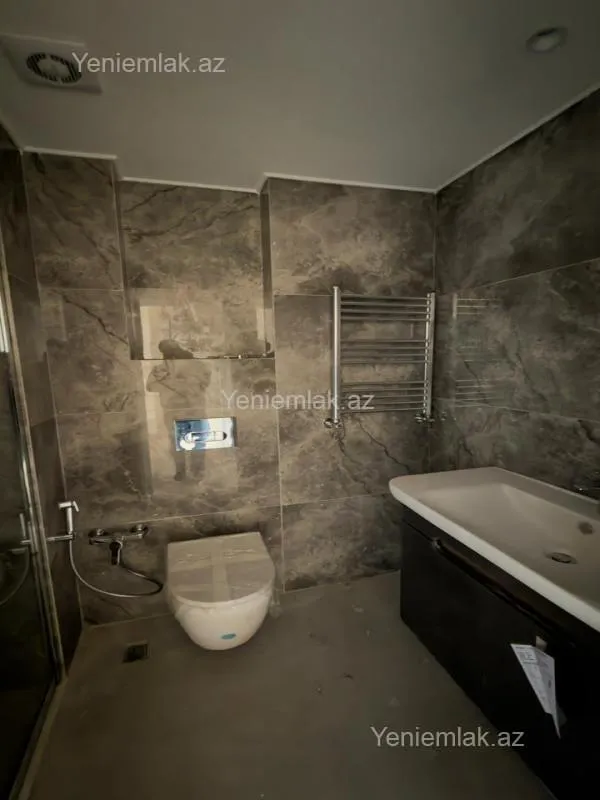 Satılır 3 otaqlı yeni tikili 97 m²