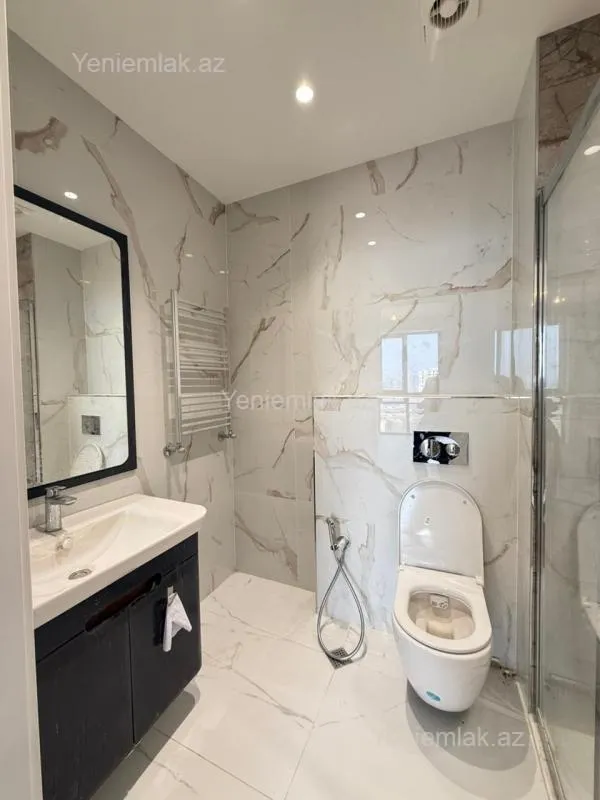 Satılır 4 otaqlı yeni tikili 123.5 m²