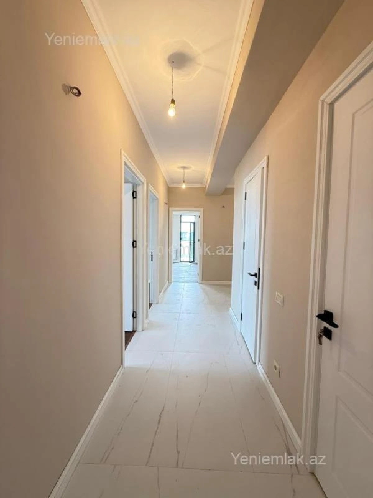 Satılır 4 otaqlı yeni tikili 123.5 m²