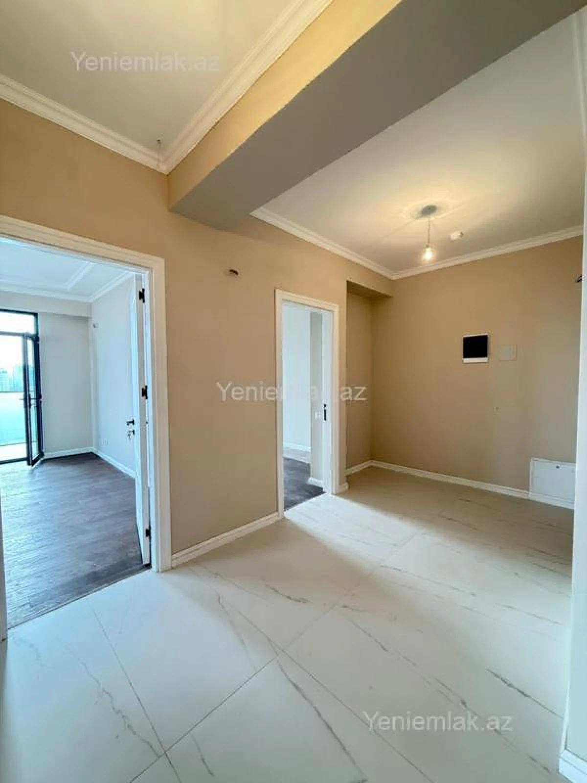 Satılır 4 otaqlı yeni tikili 123.5 m²