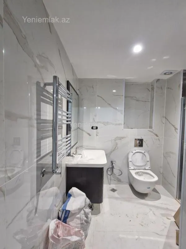 Satılır 2 otaqlı yeni tikili 64 m²